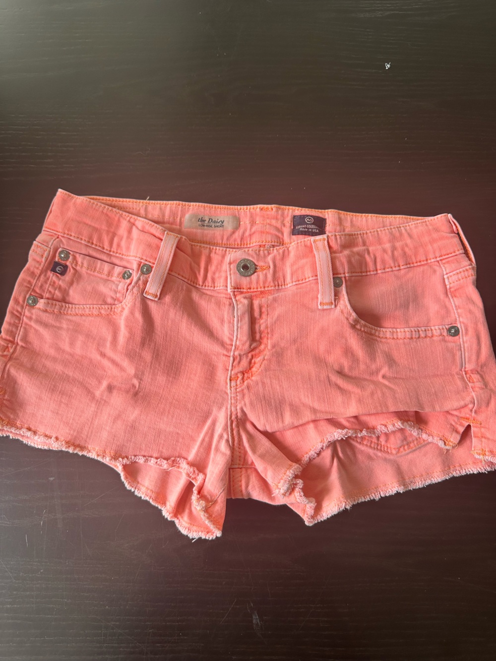 AG Adriano Goldschmied Coral Pink Denim Cutoff Shorts